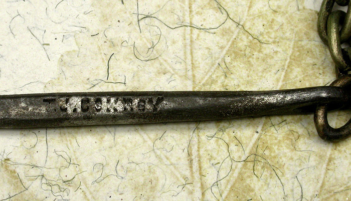 12c T J Conroy, “Armisac Pass”, 14/0, needle eye, with chain, knife point, forged, tinned. 1900’s collection. Original tag reads, J O Copeland & Co, North Attleboro Mass., Feb 16/05, No 15A, FS & Dz or Dg.