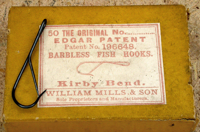 13. Edgar Patent Barbless Hooks, #?, kirby bend, blued, patent No. 196648, made by William Mills & Son, sole proprietors and manufacturers. About 1 ½” long.
