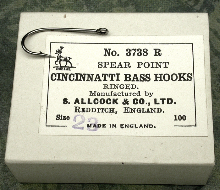 17. S. Allcock & Co., Cincinnatti Bass hooks, 3738 R, #23, 1” long, ringed, bright, kerbed, Redditch England.