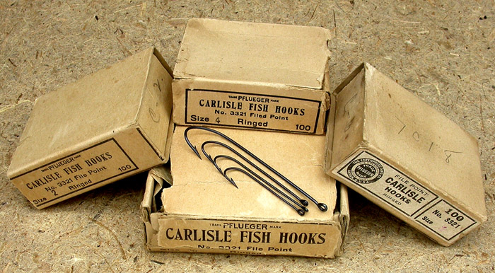 25. Pflueger Carlisle Fish Hooks, various sizes, ringed, blued.
