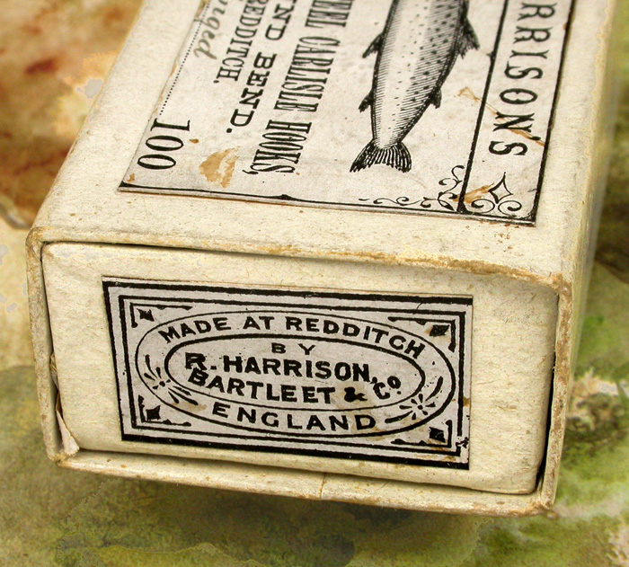 28b  Harrison's Carlisle hook and box, about 1 7/16” long, England.