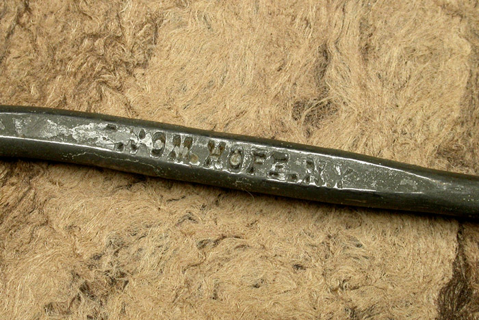 7b E Vom Hofe, Van Vleck hook, about 14/0, tinned, knife edge, needle eye, ca 1910. You can see how thick the plating was back in the day. On some hooks, the stuff just flakes off. On this hook, much of the lettering of the names has been filled in but enough remains to be able to read them. Modern plating technology lays down very thin layers with much better adhesion. Part of the 1900’s collection.