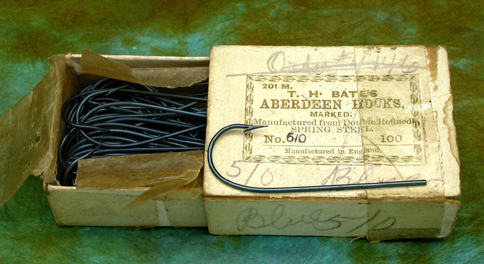 15. T H Bate’s, Aberdeen hooks, #5/0, blued. Marked. Ca 1859 to 1874