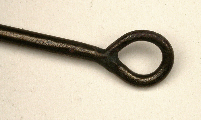 33b The second Washburn, sample hook, 13/0, hand formed tapered, welded ring eye, bronzed, ca 1904. The eye on this hook is also very big. Once again, the hand filing is great. The original tag reads, Washburn, Riner Hook. 1900’s collection.
